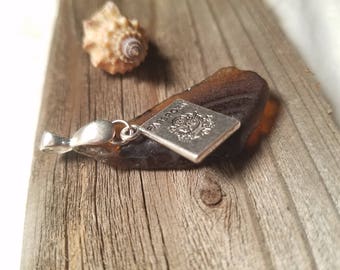 Brown ridged sea glass pendant w/passport charm
