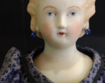 Vintage antique Parian blonde-haired woman doll