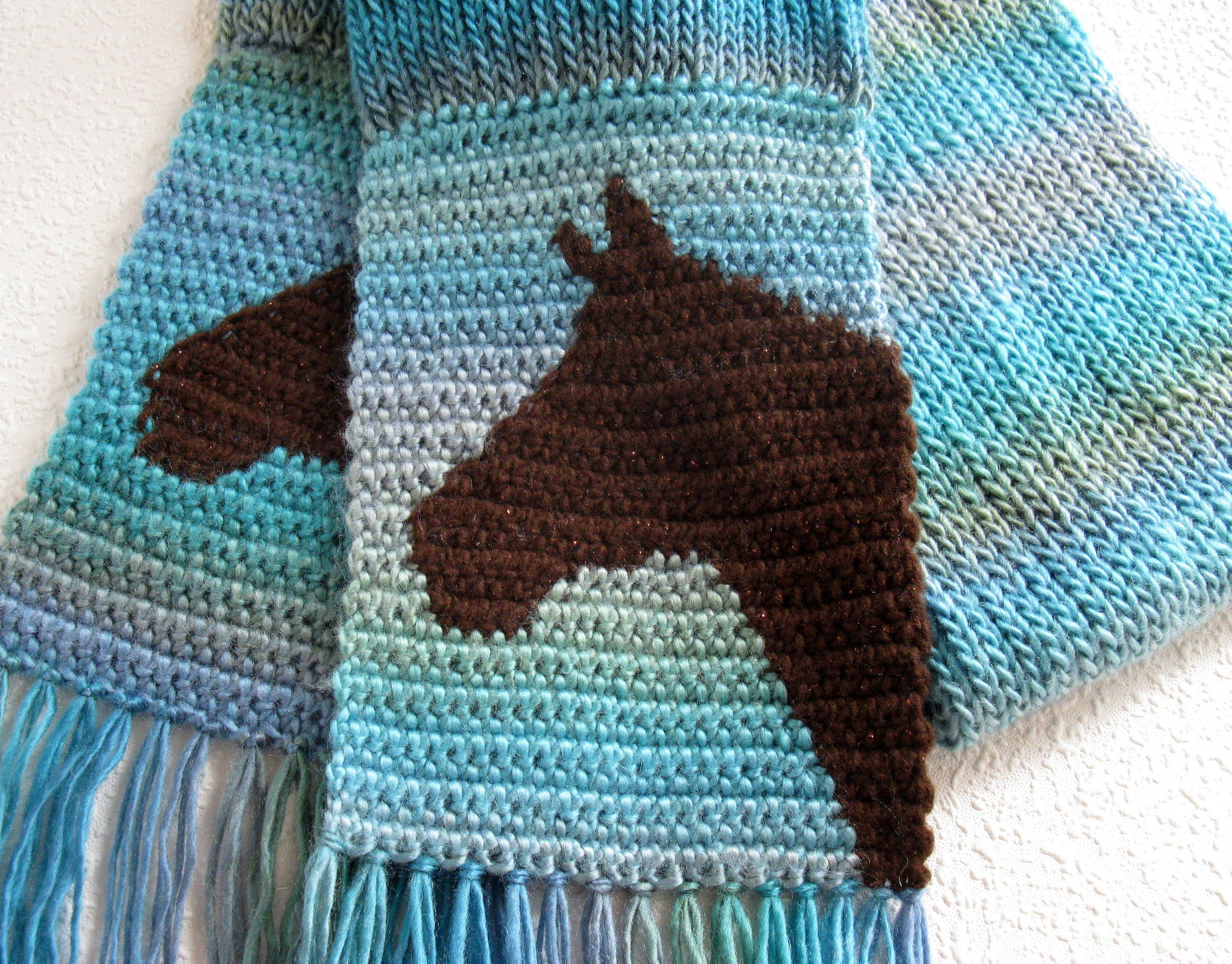 Knitted Horse Scarf. Aqua blue knit and crochet scarf with