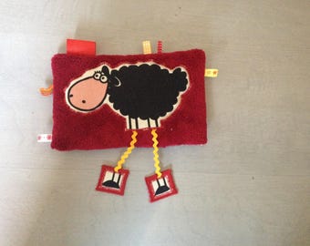 Burgundy Doudou sheep with long legs