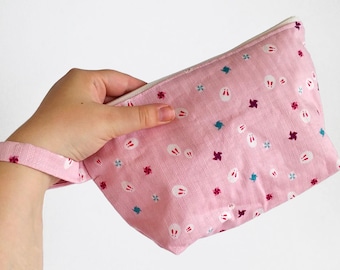 Make-up bag, pouch, pencil case, clutch made from pink vinyl with bunnies - Water resistant Japanese fabric