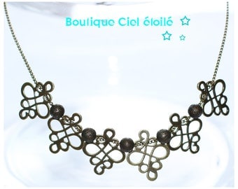 Mid-length bronze necklace arabesque