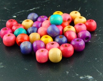 20 wooden 10 X 9 mm round beads