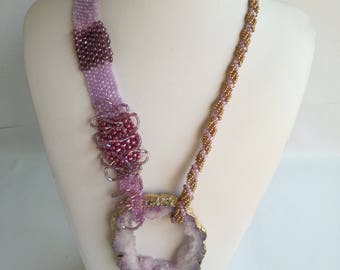 Freeform necklace crafted with crystals,agate and beads.