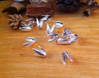 shiny 12 cups c., 4 petal flowers, silver beads