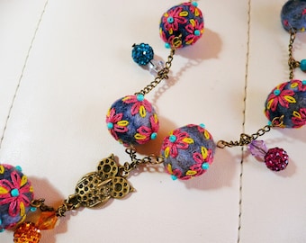 necklace made of felted wool embroidered, blue, neon yellow beads