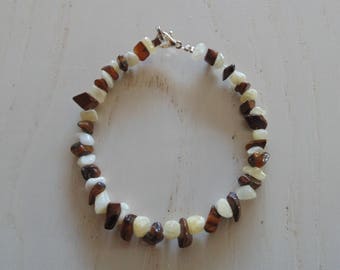 a bracelet made of two kinds of stones gems.