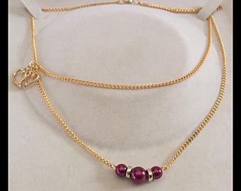 Necklace double strands with hearts and glass beads.