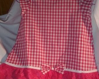 Girl in gingham and lace fabrics dress