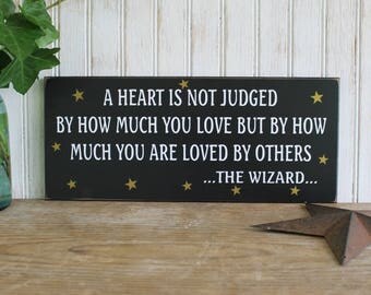 Wood Sign Wizard Of Oz A Heart is not Judged Wall Decor, Plaque Wizard Quote Wall Art Painted Black