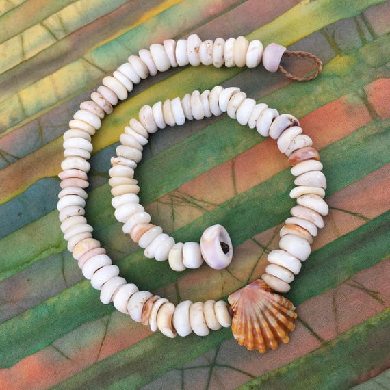 Keiki child necklace of puka and Hawaiian sunrise shell