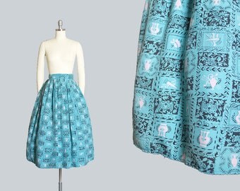 Vintage 1940s Skirt | 40s Novelty Print Blue Rayon Archery Bows Arrows Hats Floral Geometric Pleated Full Skirt (xs)