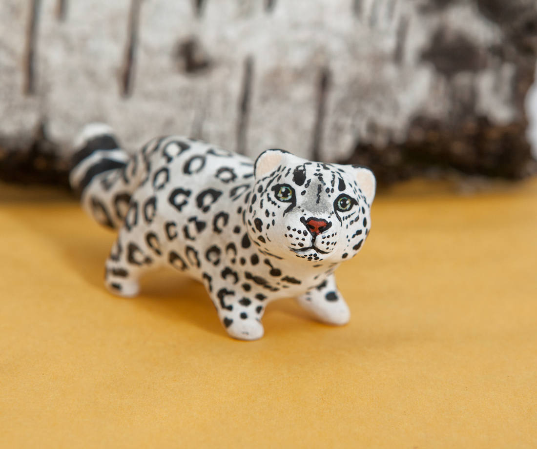 snow leopard figurines