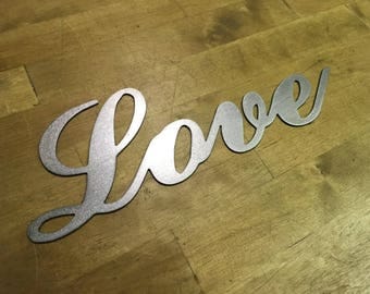 Cursive love sign | Etsy