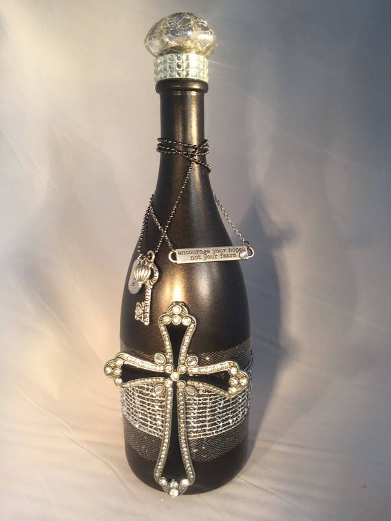 Large Decorative bottle with black finish ornate cross