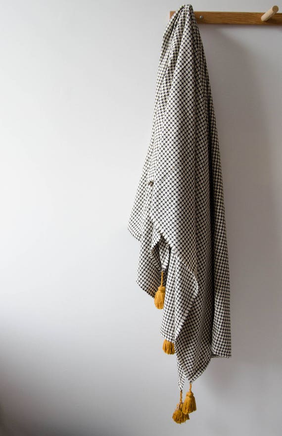 Handmade Black and White Throw Blanket with matching pompoms/tassels