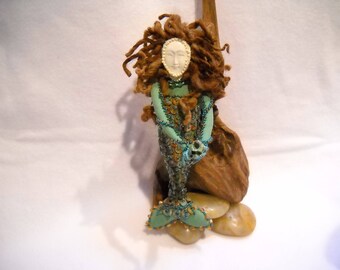 Mermaid of patina copper