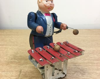 Vintage wind up toy. Wonderful Celluloid/Tin Xylophone Player. Made in Occupied Japan.