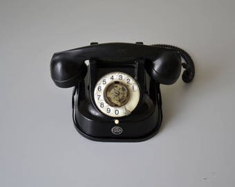 Vintage black bakelite telephone / rotary dial phone RTT / mid century design 50s