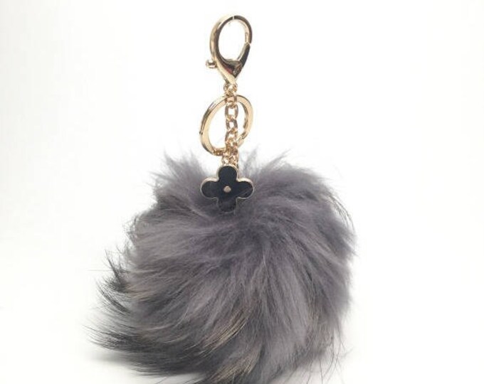 Dark Gray red with natural markings Raccoon Fur Pom Pom luxury bag pendant + black flower clover charm keychain