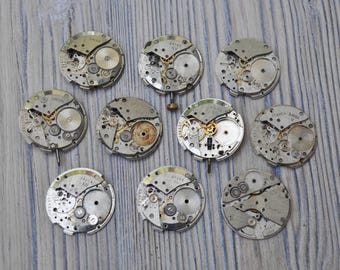 0.9 inch Set of 10 vintage wrist watch movements.