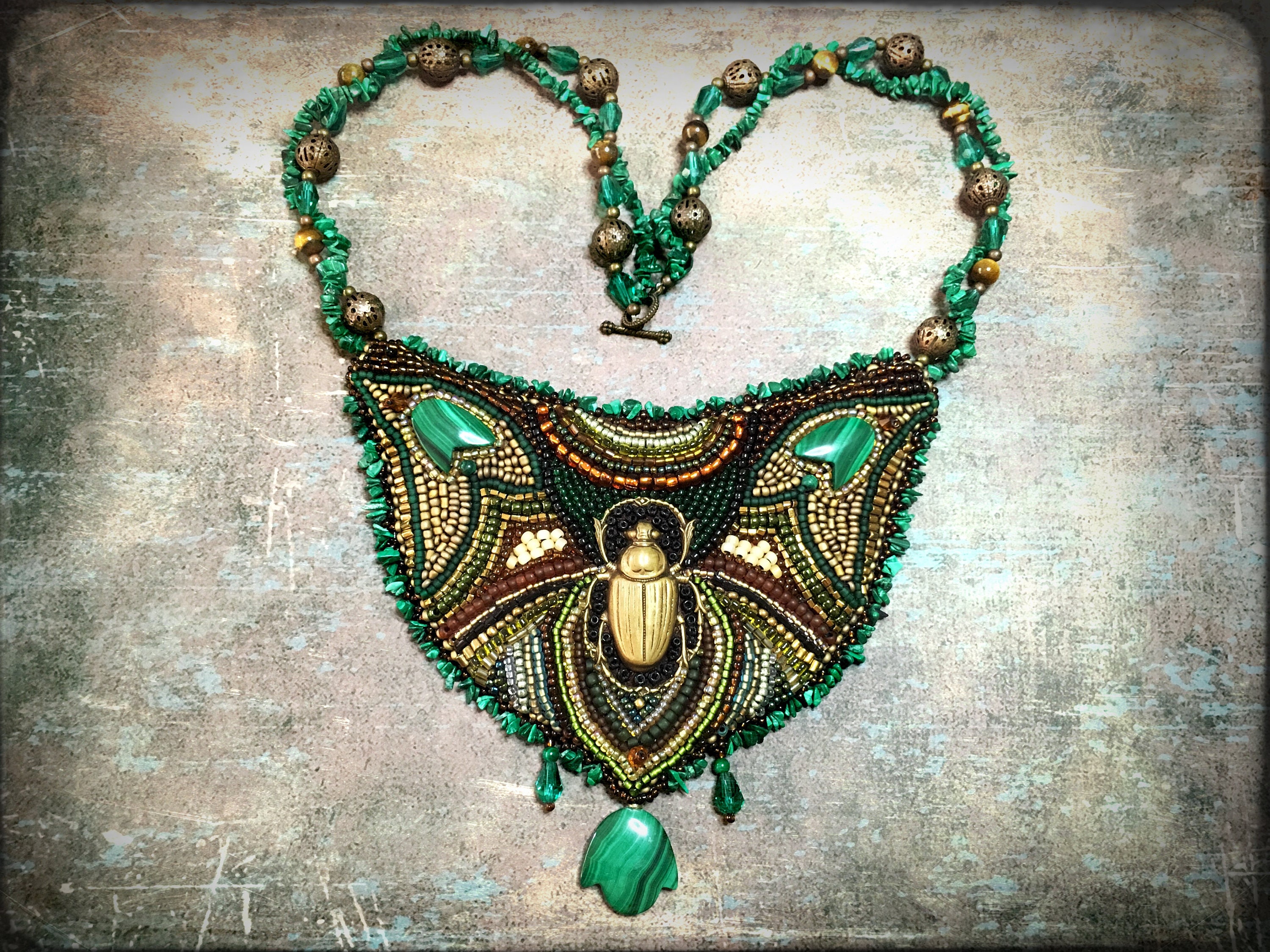 Bead embroidered necklace with scarab and natural malachite