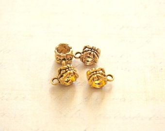 4 bails metal embossed gold 11 x 7, 5mm