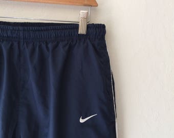 swishy nike pants