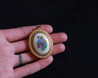 vintage porcelain violets pearl trimmed gold locket • large floral locket pendant necklace • blue & purple violets, faux seed pearls • AVON
