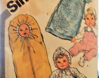 1982 Simplicity Pattern 5735 Partially Cut Babies Layette Size 6 months..pieces counted..view 1 bunting is CUT only
