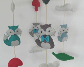 Driftwood mobile and its felt foxes