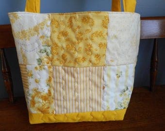 yellow quilted bag