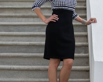 Black dress with white/black Prints on top and sleeves