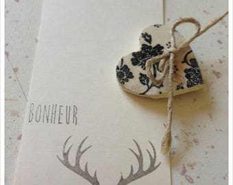 2 small stamps unmounted with handwriting * happiness *.