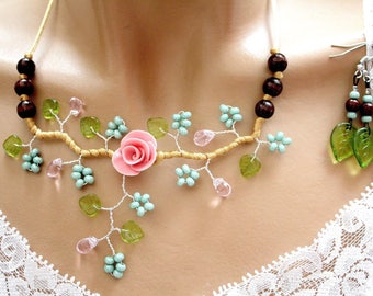 Pink and green floral ornament