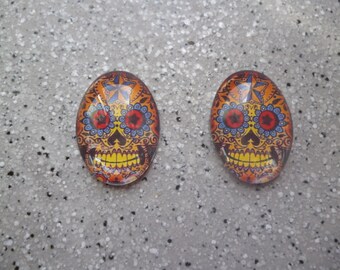 Lot de 2 cabochons images tête de mort, skull