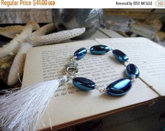 SALE The Liquid Moondrops Quartz Bracelet. Electric Blue Mystic Titanium AB Quartz Smooth Nugget beads & White Silk Tassel Bracelet