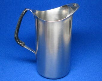 WMF Cromargan Germany stainless steel pitcher with wrapped handle .
