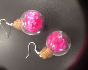 glass jars filled with glitter pink diamond shaped earrings