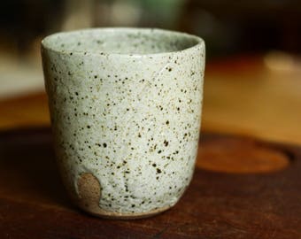 Stoneware Yunomi in oatmeal glaze with incised decoration