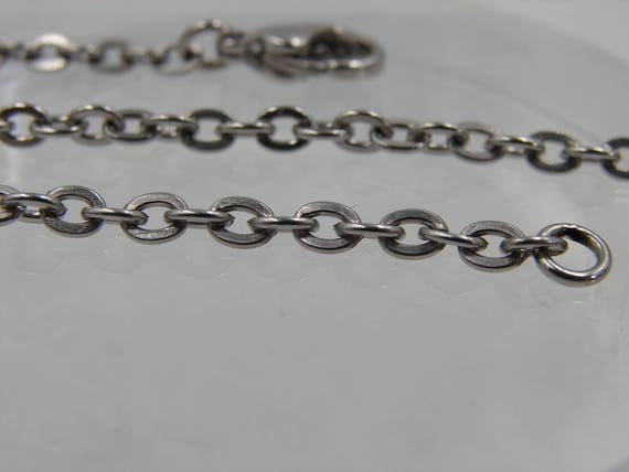 3.3mm Stainless steel chain w/stainless lobster claw clasp. Micro tig welded jump rings. *Bulk purchased to offer you wholesale prices*