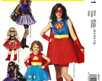 McCalls Costumes MP371 Sewing Pattern for Girls Halloween Outfits Supergirl Batgirl Cape Dress Skirt Mask Boot Cover Gauntlet Uncut