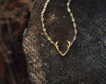 forest dweller. a whimsical vermeil gold deer antler necklace.