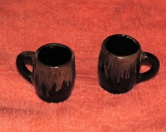 Two Miniature Stoneware Dark Brown Cups