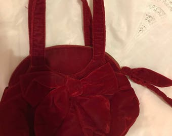 red purse with bow