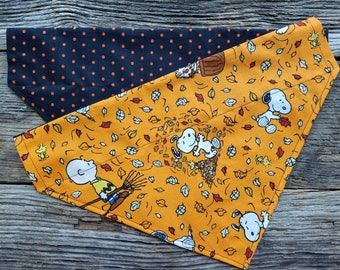 Dog bandana fall leaves and halloween colors slide over the collar