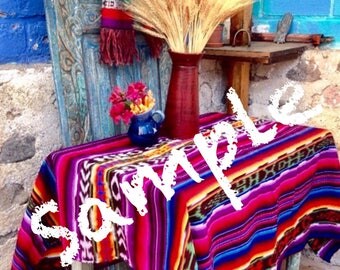 The vintage tzute fabric is a taditional multipurpose woven cloth use as a shawl a picnic blanket a table cloth the possibilities are endles