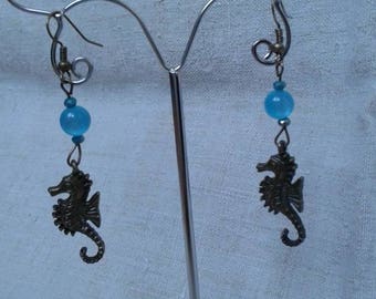 seahorse earrings and blue bead