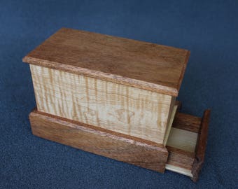 Keepsake box with hidden compartment
