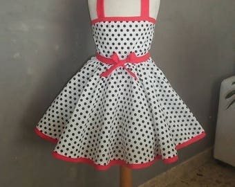 White cotton dress with polka dots.